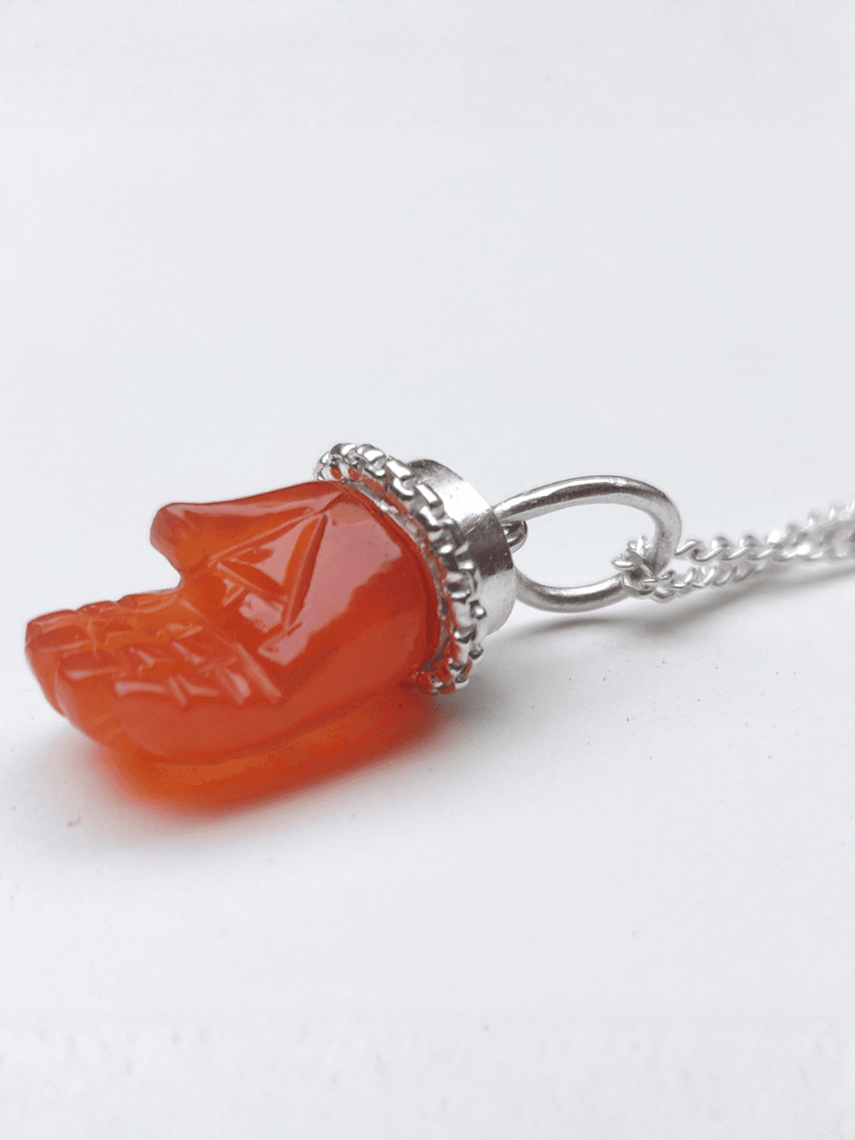 PICHWAI CARNELIAN HAND PENDANT