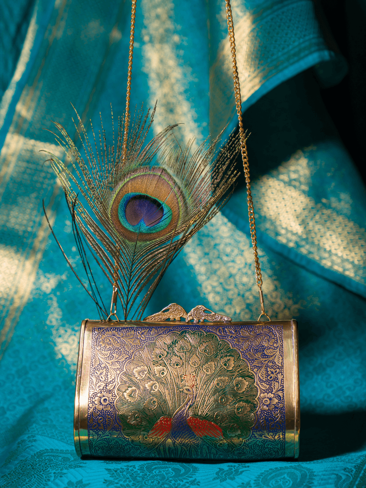 Ethnic Peacock engraved brass clutch