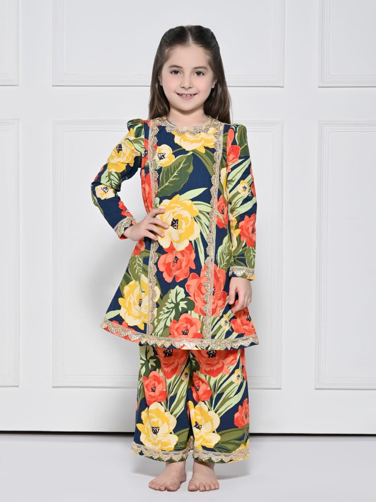 A NAVY BLUE COTTON SUIT WITH A BOLD FLORAL PRINT A NAVY BLUE COTTON SUIT WITH A BOLD FLORAL PRINT